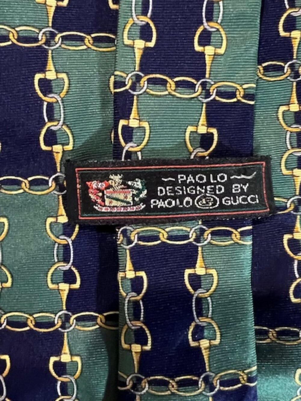 Vintage Paolo Gucci 100% silk tie green and‎ navy blue equestrian-themed pattern